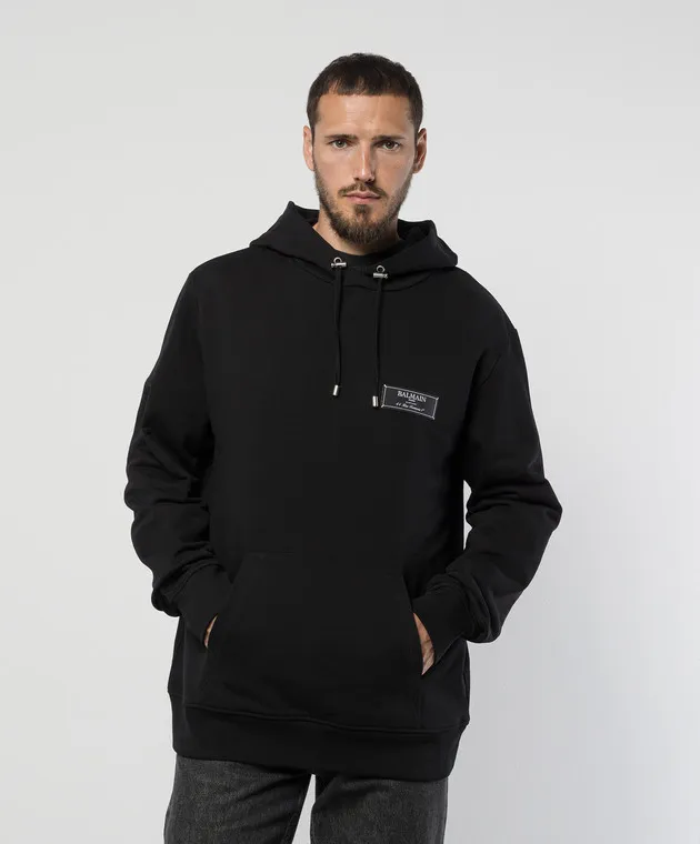 Balmain Felpa nera con cappuccio e patch logo DH1JT047JB53