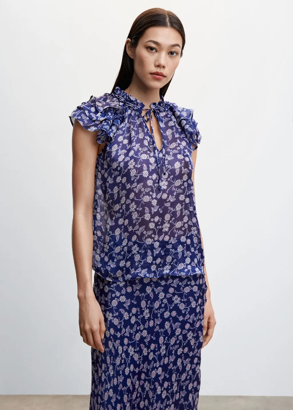 Blusa floreale volant