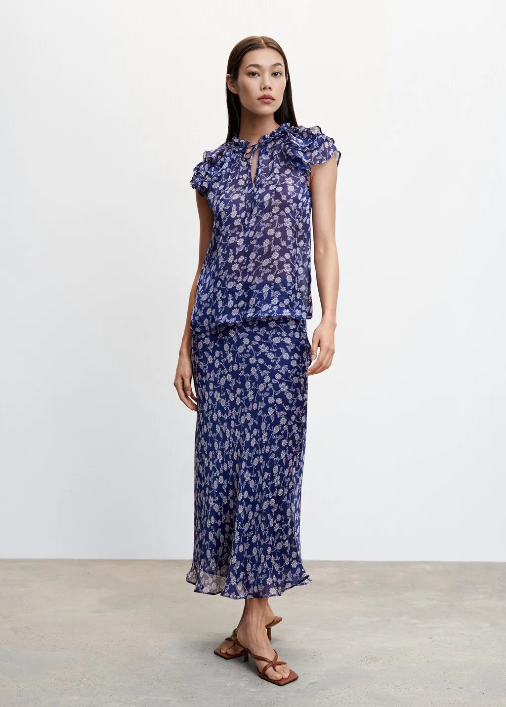 Blusa floreale volant
