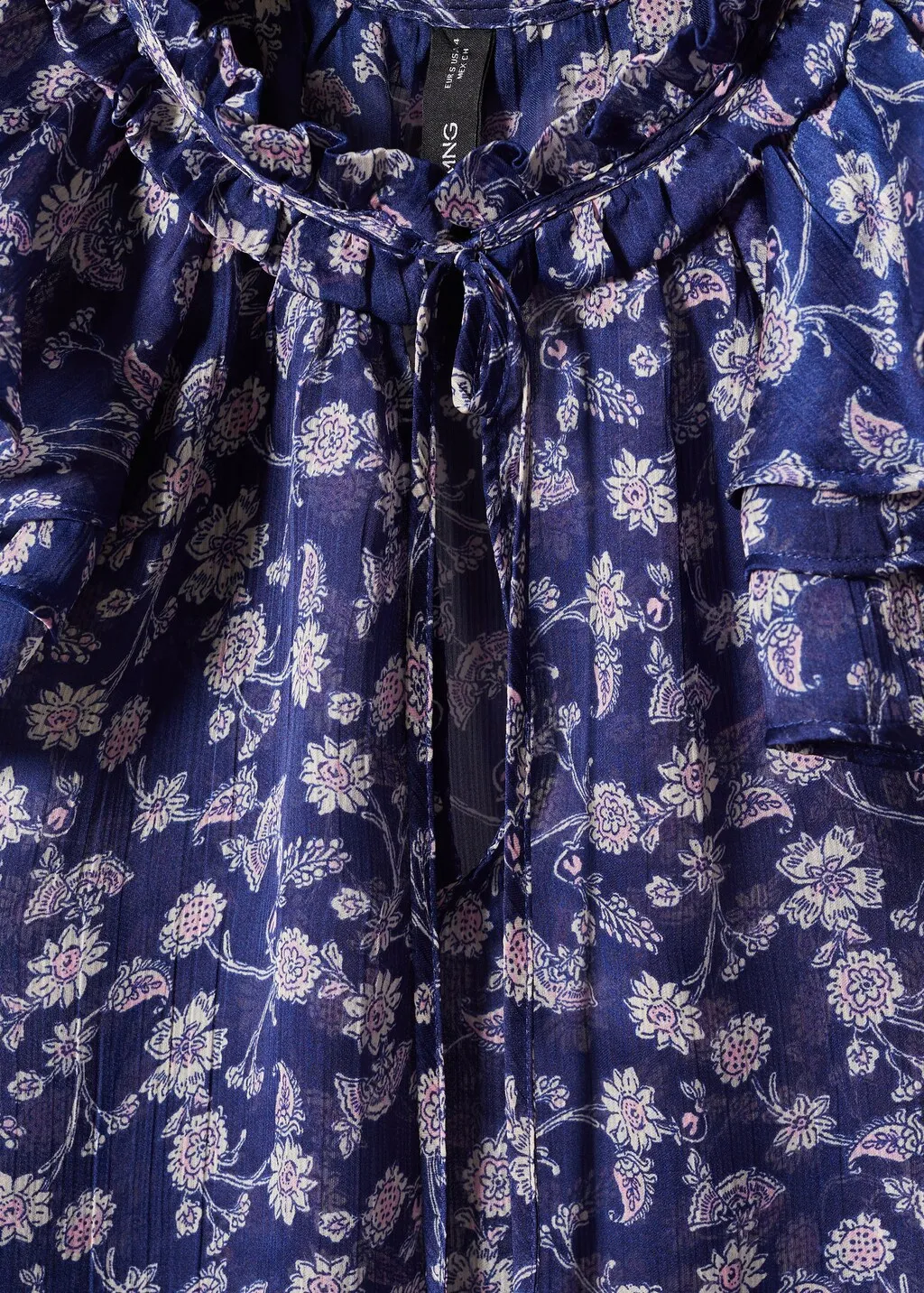 Blusa floreale volant