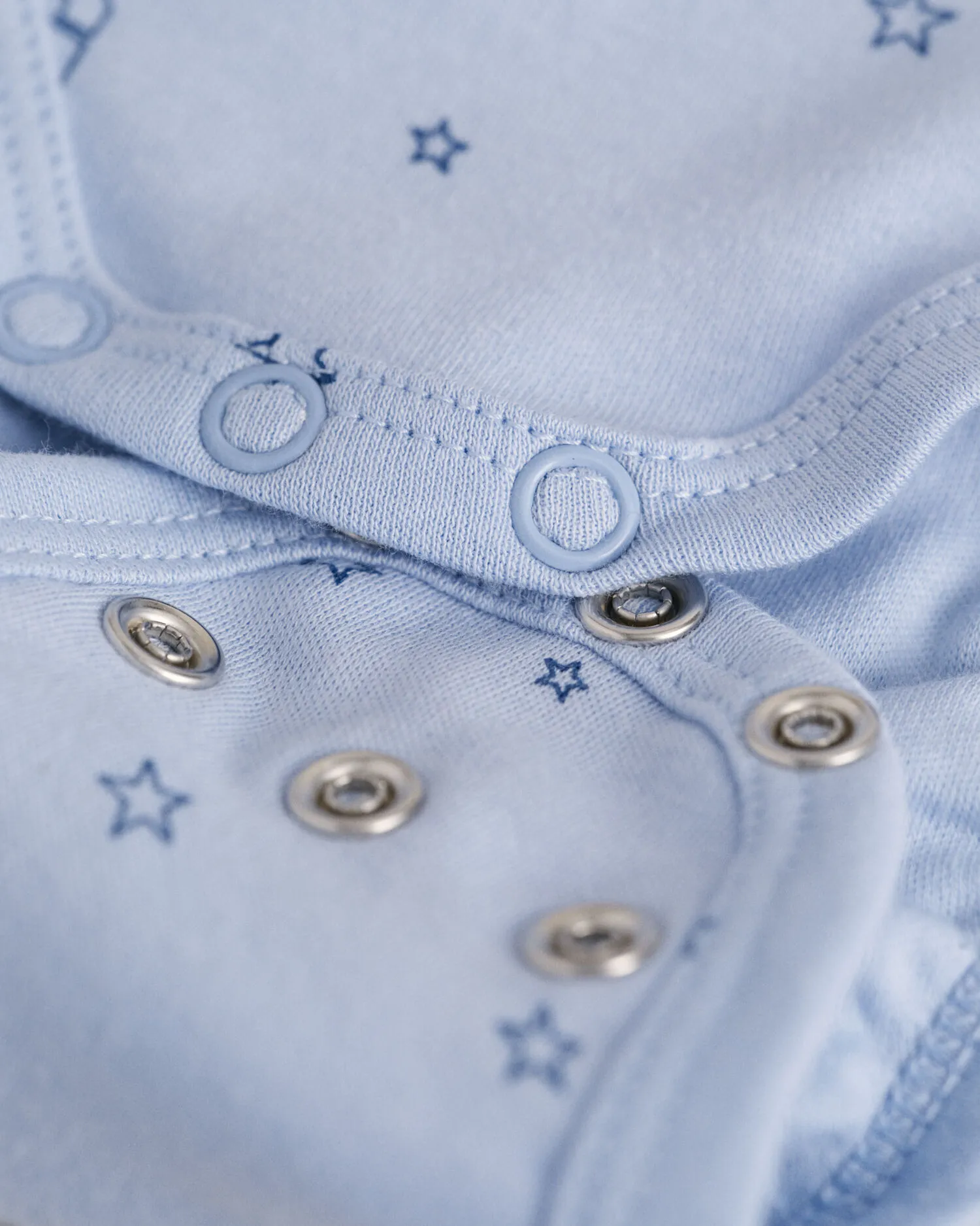 Body con stampa di stelle e G Baby    