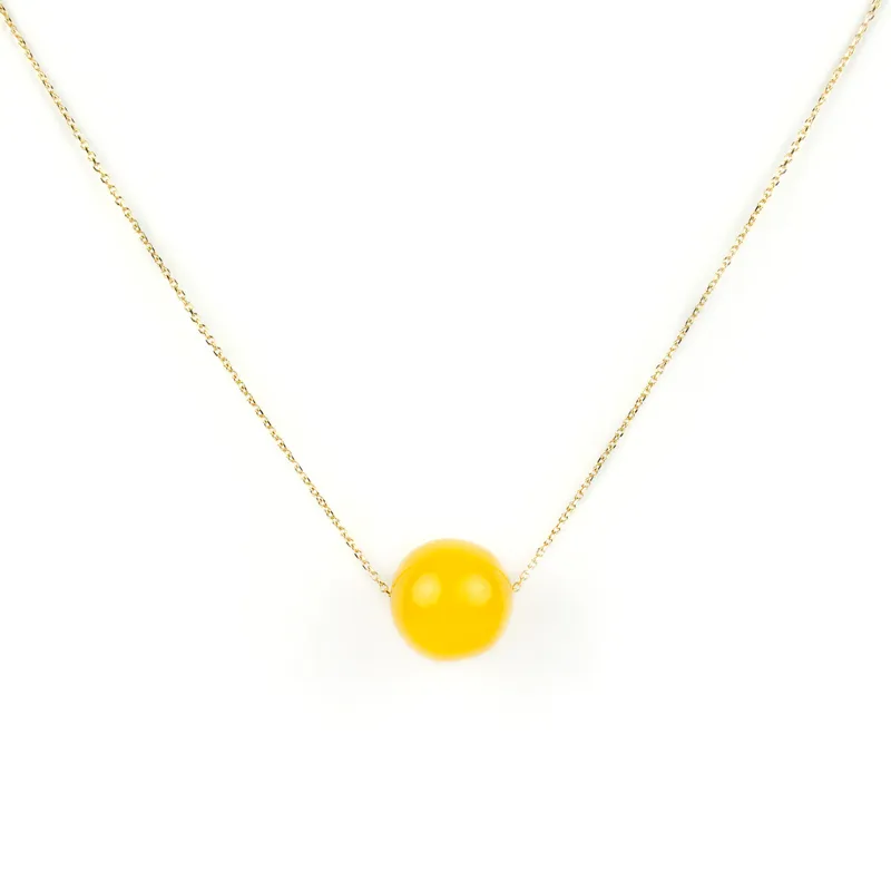 Collana in oro giallo con pietra modello ambra gialla passante
